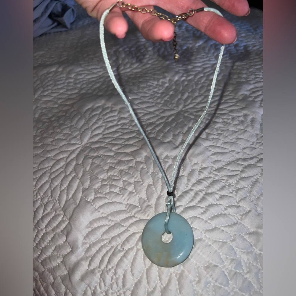 Light blue “doughnut “ center stone boho cord adjustable necklace